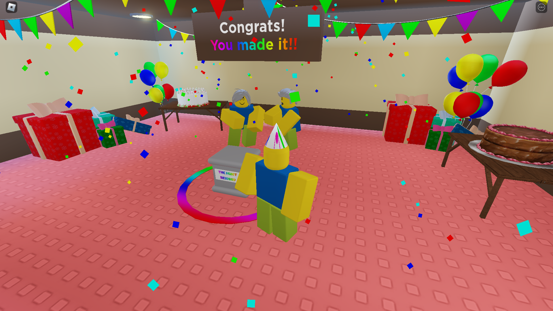 Grey haired mother and father in a room filled with tables with cakes, balloons, presents, and colorful flag banners